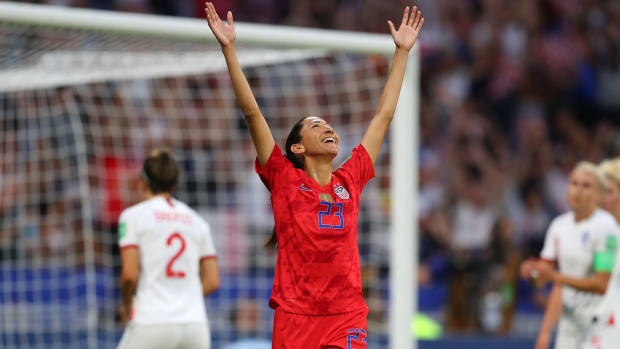 christen-press-arms-celebration-mom-uswnt.jpg